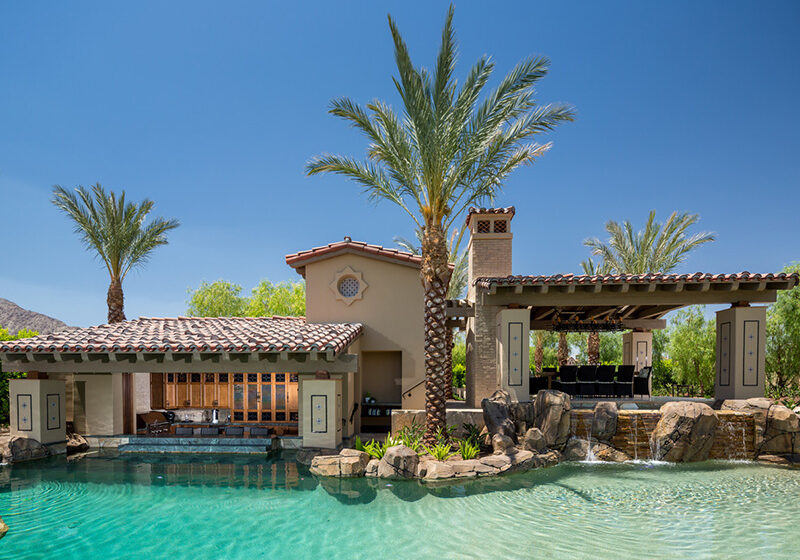 A California home with a custom artificial rock pool designed, crafted, and installed by Matrix Concrete Artisans.